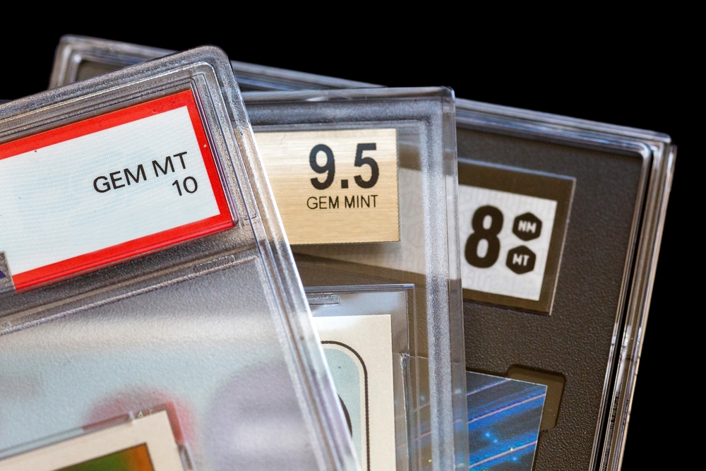 Different,styles,of,graded,sports,cards,,on,black,background