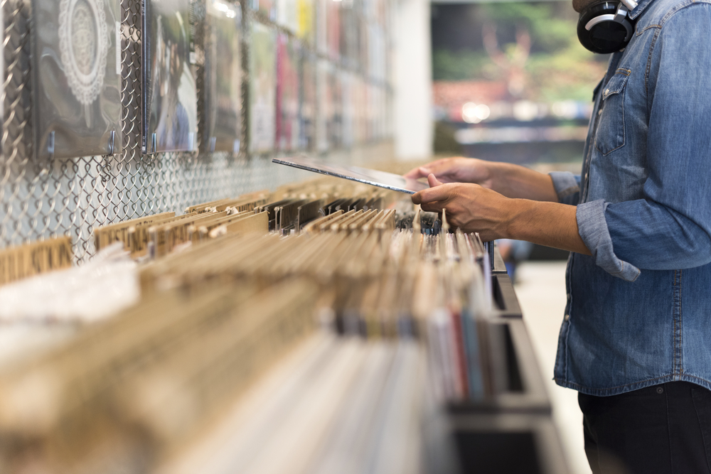 Man,browsing,vinyl,album,in,a,record,store